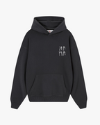 Front view of Baron & Buck ash hoodie featuring handwritten black text that reads, “HA HA ” — a soft, poetic streetwear statement.