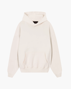 Front view of Baron & Buck Marshmallow hoodie featuring blue text that reads, “Strong ass bitch” — a soft, poetic streetwear statement.