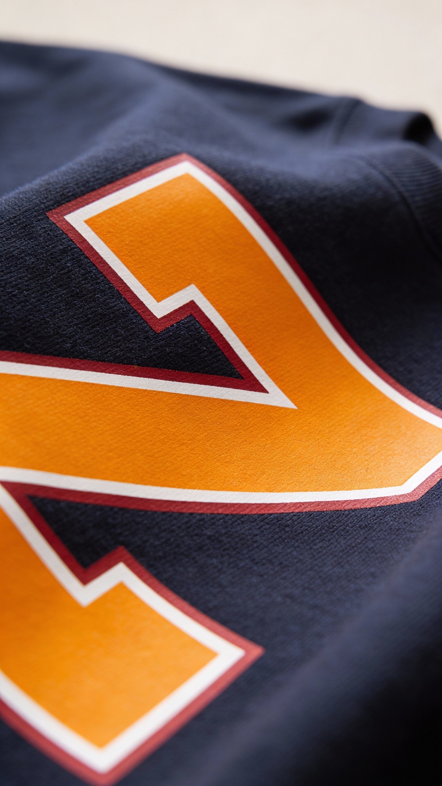 Close-up of varsity monogram letter Z print on French Navy cotton sweatshirt