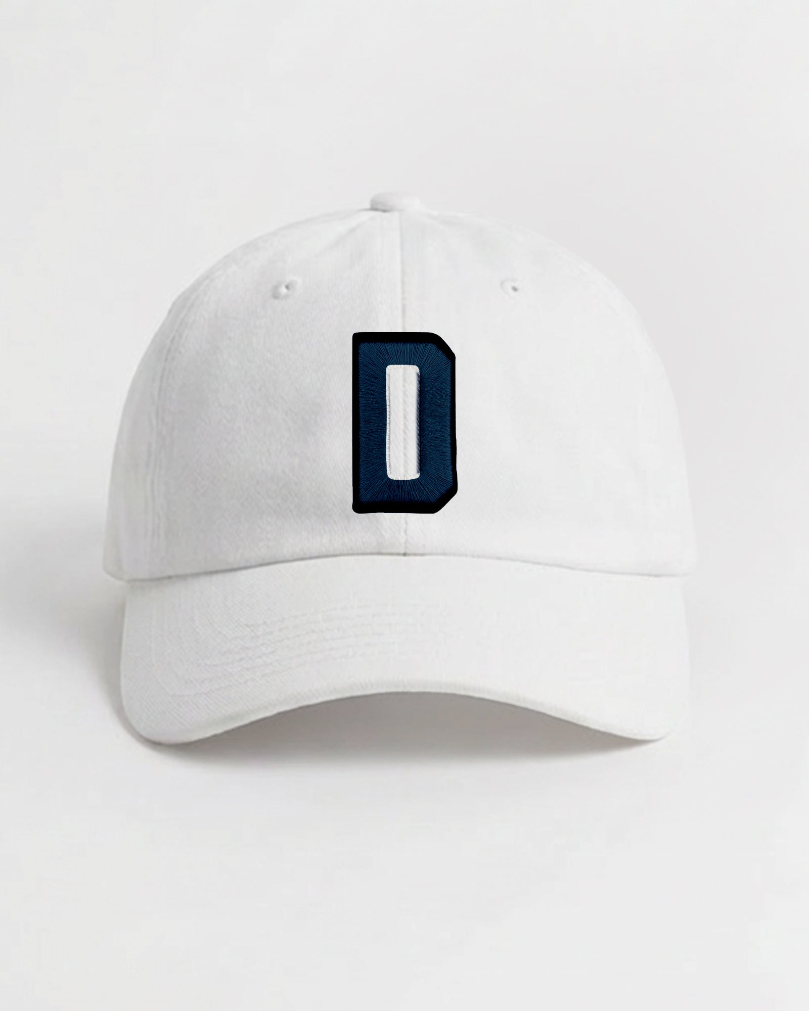 Harbour Monogram White cotton cap with embroidered letter D by Baron & Buck