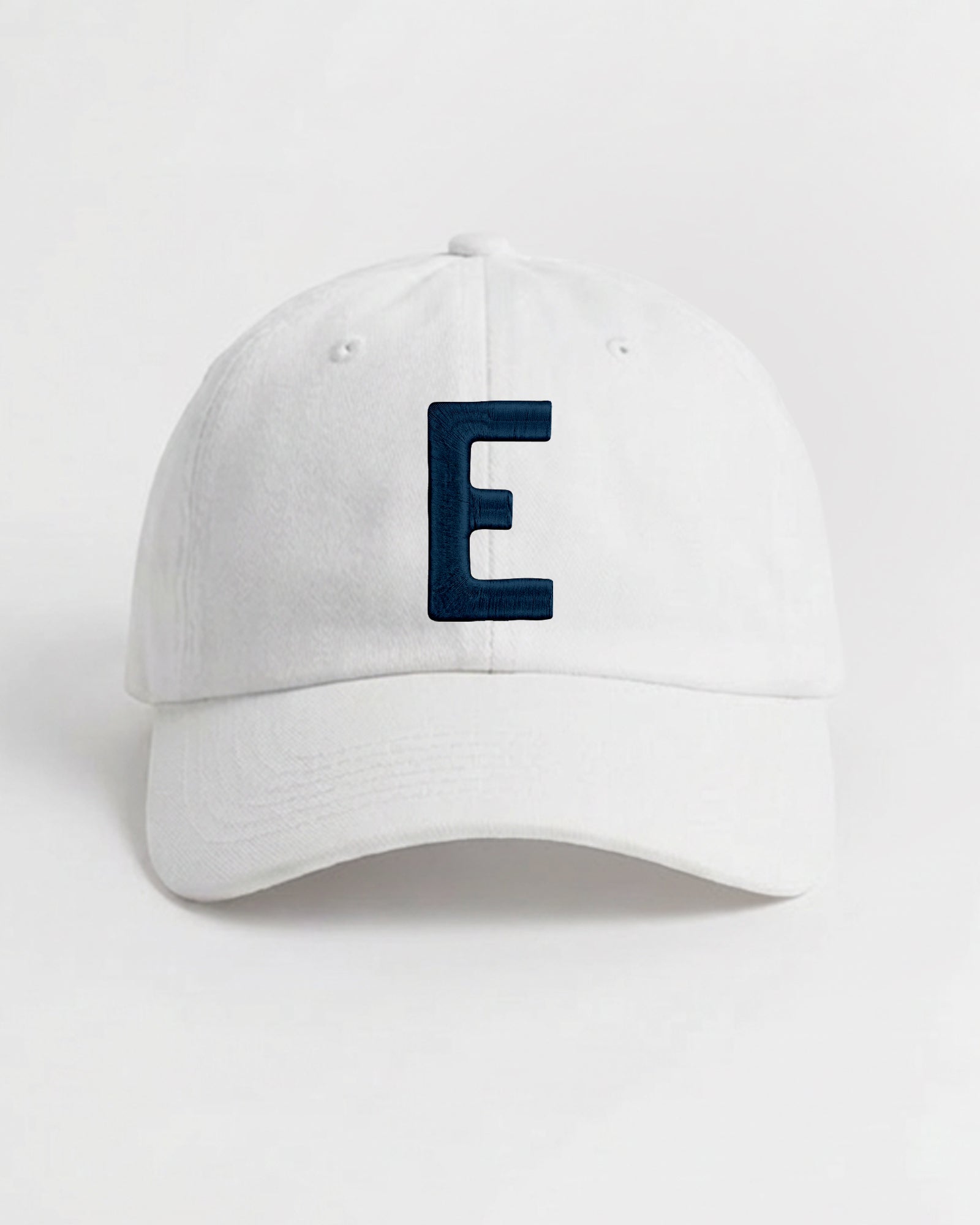 Harbour Monogram White cotton cap with embroidered letter E by Baron & Buck