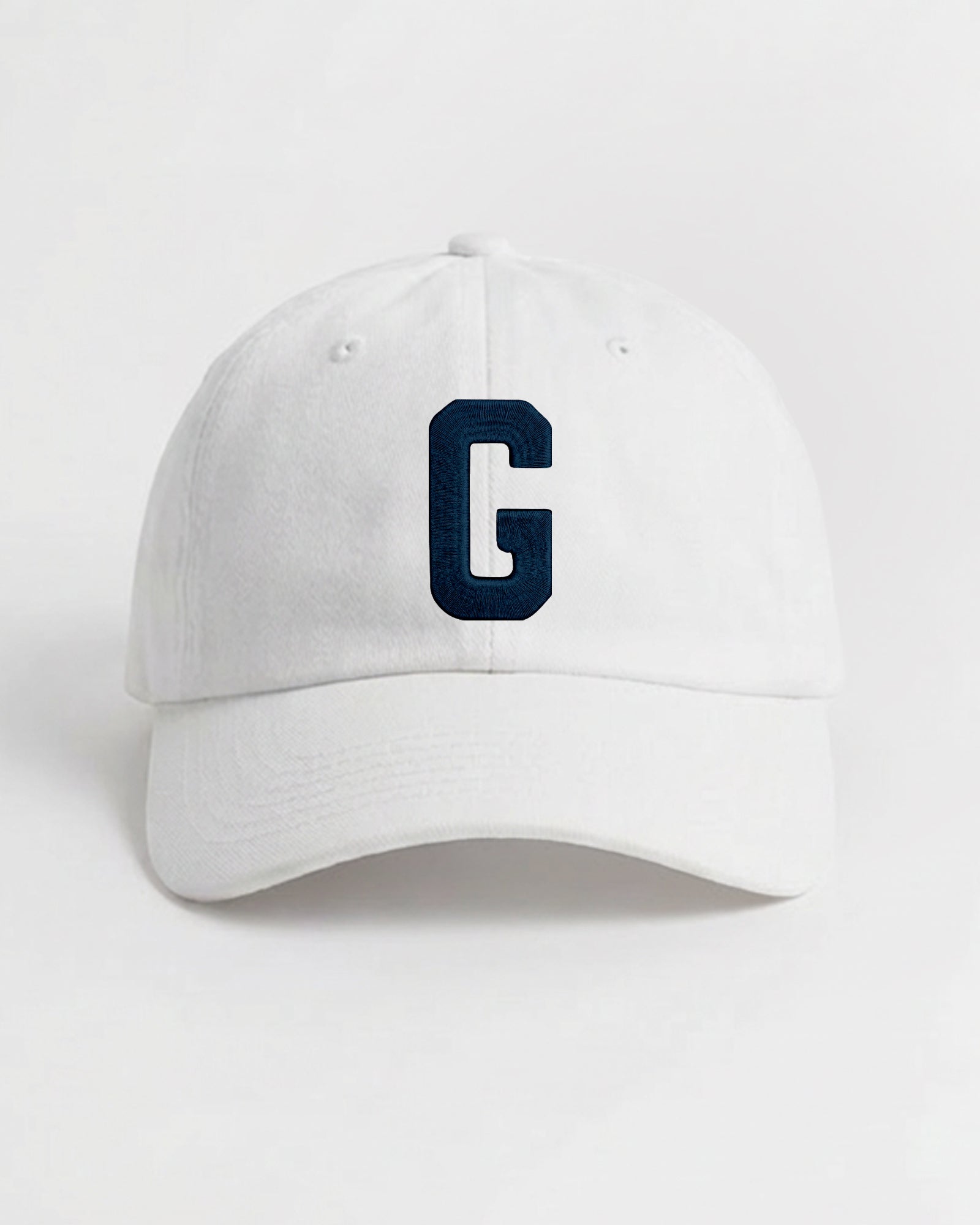 Harbour Monogram White cotton cap with embroidered letter G by Baron & Buck