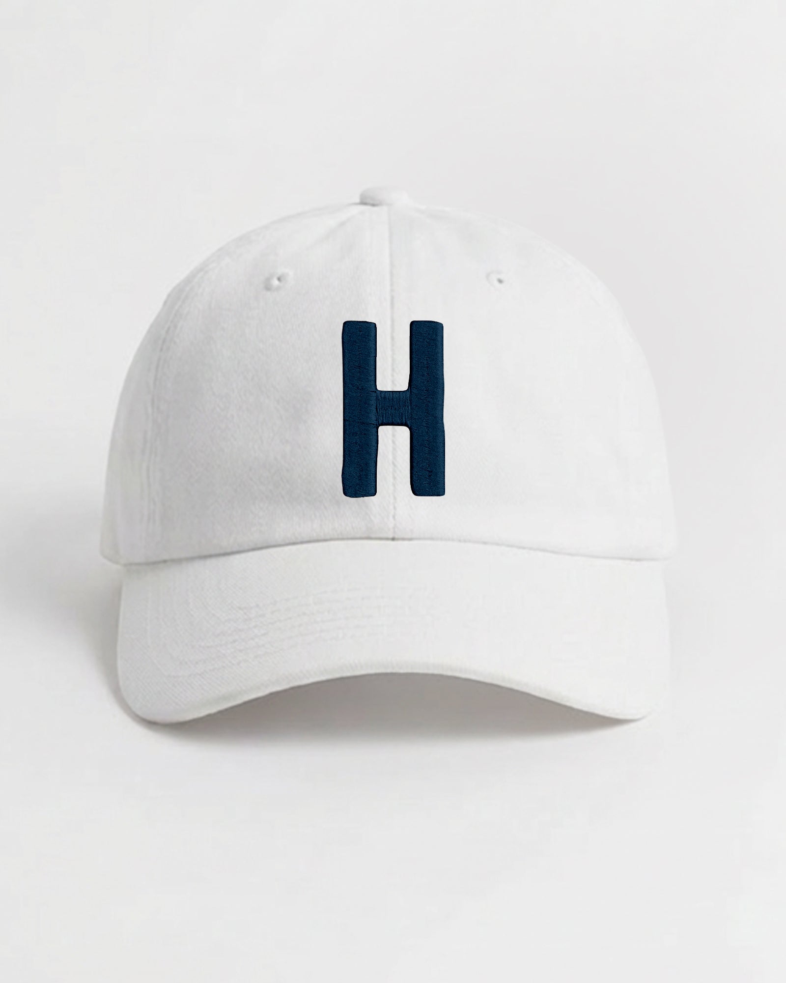 Harbour Monogram White cotton cap with embroidered letter H by Baron & Buck