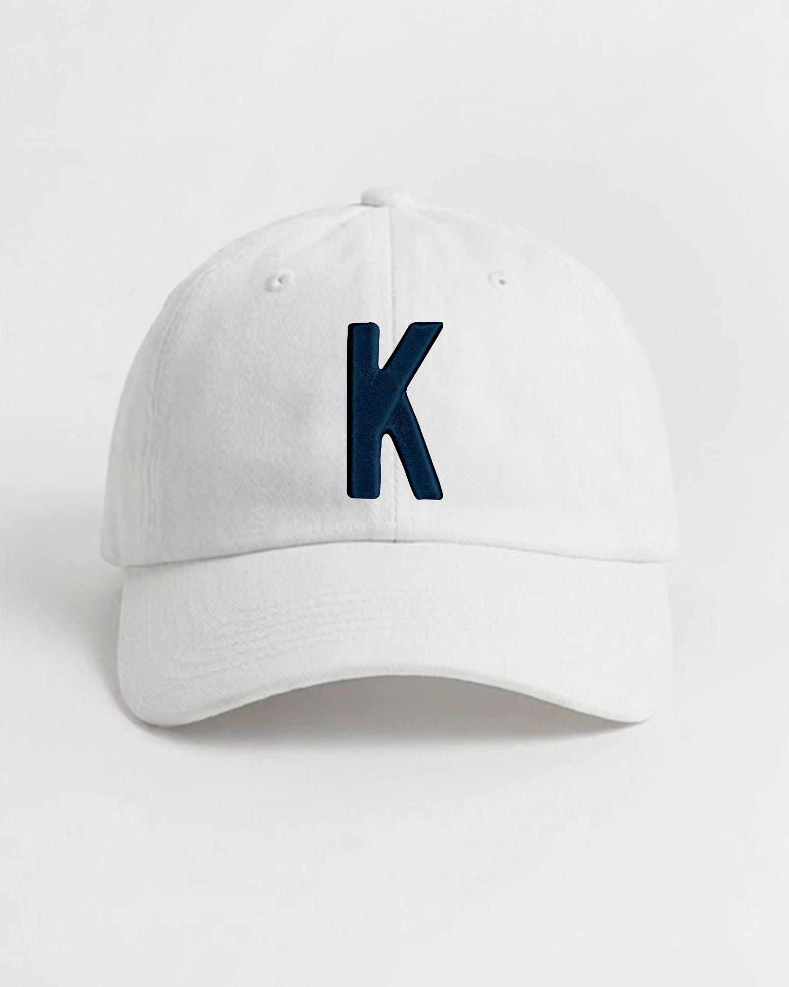 Harbour Monogram White cotton cap with embroidered letter K by Baron & Buck