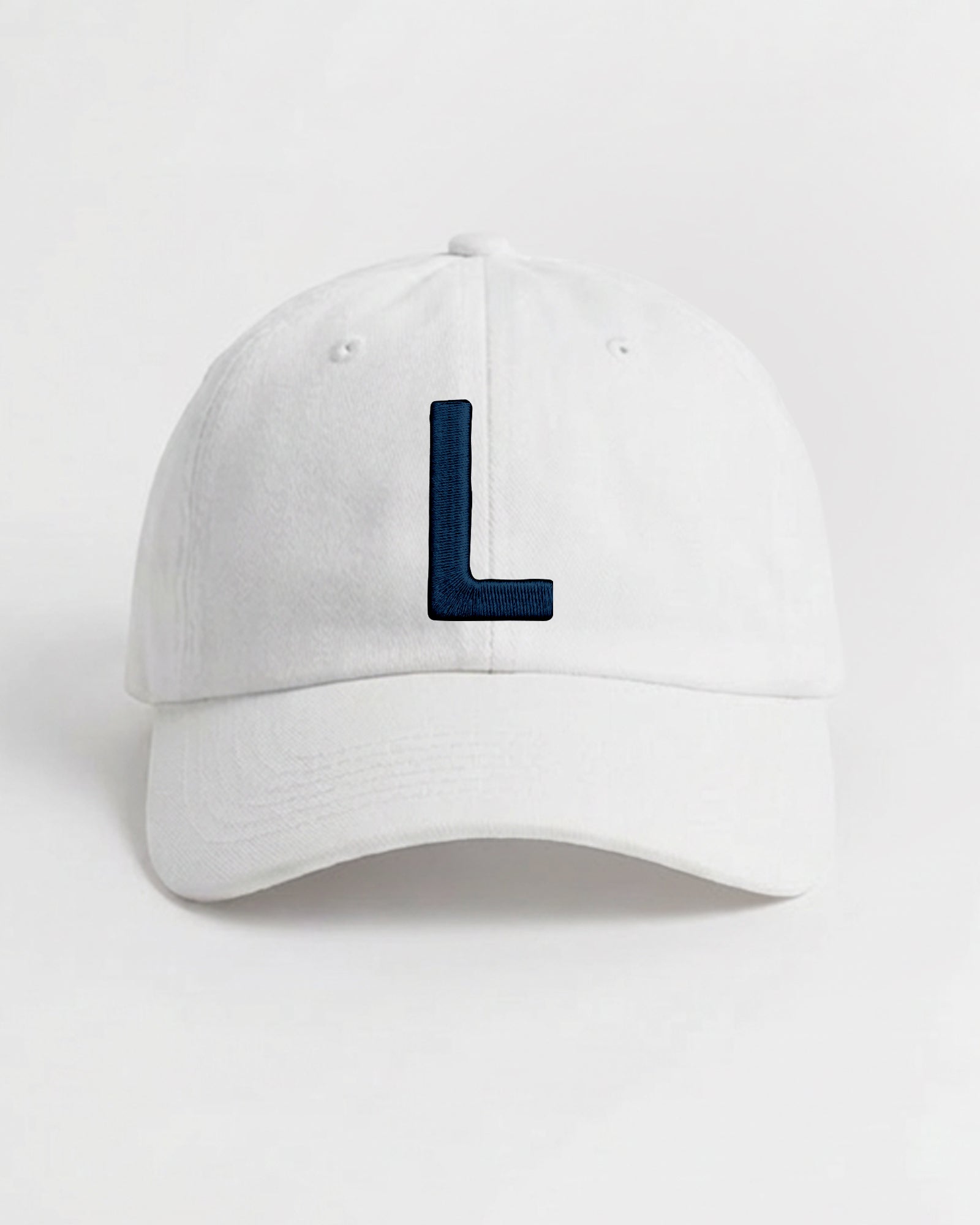 Harbour Monogram White cotton cap with embroidered letter L by Baron & Buck