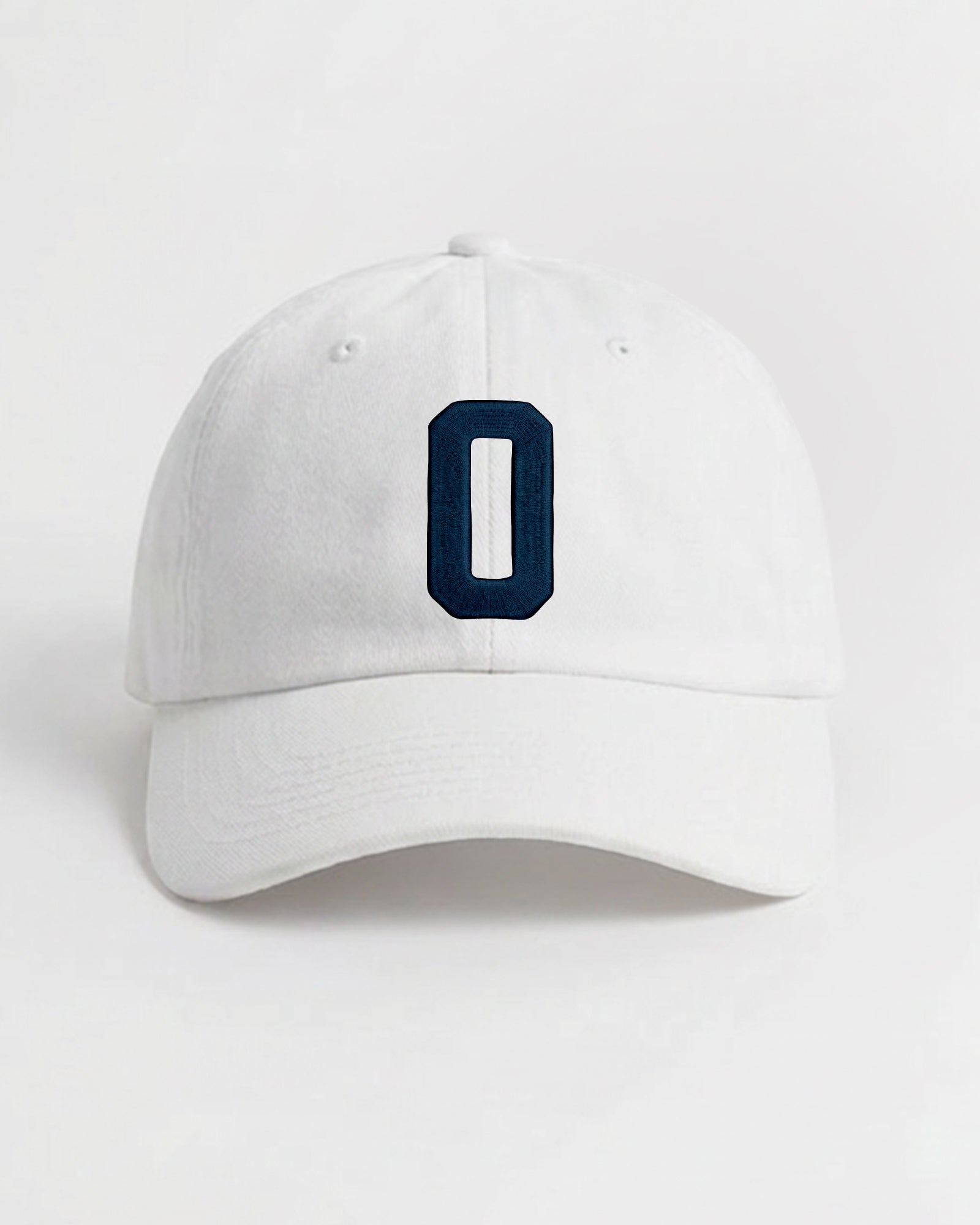 Harbour Monogram White cotton cap with embroidered letter O by Baron & Buck