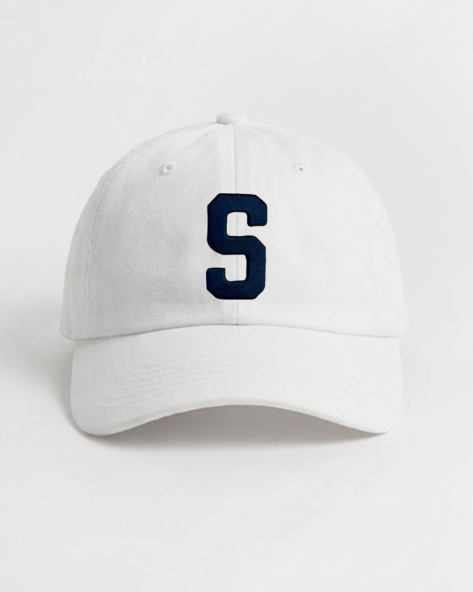 Harbour Monogram White cotton cap with embroidered letter S by Baron & Buck