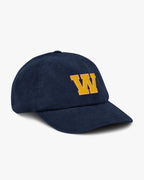Side angle of Baron and Buck varsity monogram corduroy hat in Oxford Navy, showing embroidered monogram and structured crown