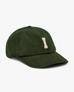 Side angle of Baron and Buck varsity monogram corduroy hat in Dark Olive, showing embroidered monogram and structured crown
