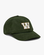 Side angle of Baron and Buck varsity monogram corduroy hat in Dark Olive, showing embroidered monogram and structured crown